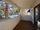 A cozy balcony with a view of the community pool and mature trees, perfect for relaxing at 101 Luna Way # 222, Las Vegas, NV 89145