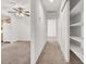 Hallway leads to the kitchen and contains storage and hallway closet at 101 Luna Way # 222, Las Vegas, NV 89145
