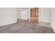 Spacious living room features neutral carpet, built-in shelving, and natural light throughout at 101 Luna Way # 222, Las Vegas, NV 89145