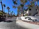 Exterior view of complex with manicured landscaping and street access at 101 Luna Way # 222, Las Vegas, NV 89145