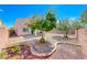 Spacious backyard with low maintenance desert landscaping and privacy fence at 1033 Logan Patrick Dr, Henderson, NV 89052