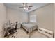 Bedroom featuring carpet flooring, neutral walls, and a ceiling fan at 1033 Logan Patrick Dr, Henderson, NV 89052
