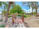 Inviting community park with a charming wooden bridge and picturesque scenery at 1033 Logan Patrick Dr, Henderson, NV 89052