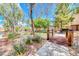 Charming community park featuring a wooden bridge and lush green landscaping at 1033 Logan Patrick Dr, Henderson, NV 89052
