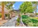 Beautiful community park with a shaded walkway and well-maintained landscaping at 1033 Logan Patrick Dr, Henderson, NV 89052