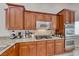 Updated kitchen features stainless steel appliances, double ovens, and granite countertops at 1033 Logan Patrick Dr, Henderson, NV 89052