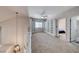 Spacious loft area features built-in shelving, and view into a bedroom at 1033 Logan Patrick Dr, Henderson, NV 89052