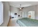 Large main bedroom with vaulted ceiling, carpet flooring, and ensuite bathroom access at 1033 Logan Patrick Dr, Henderson, NV 89052