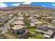 Neighborhood featuring homes with pools and desert landscaping at 10470 Dove Meadow Way, Las Vegas, NV 89135