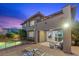 Inviting backyard with a pool, patio seating, and an open layout to the home's interior at 10470 Dove Meadow Way, Las Vegas, NV 89135