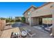 Inviting backyard featuring a private pool, patio, and lush landscaping for outdoor enjoyment at 10470 Dove Meadow Way, Las Vegas, NV 89135