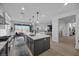 Spacious kitchen featuring a center island, modern appliances, and an open floor plan at 10470 Dove Meadow Way, Las Vegas, NV 89135