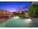 Sparkling pool with a waterfall feature, inviting for a refreshing swim at 10470 Dove Meadow Way, Las Vegas, NV 89135