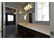 Bathroom featuring a large vanity and entry to the bedroom at 11416 Belmont Lake Dr # 102, Las Vegas, NV 89135