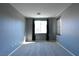 This calming bedroom features new carpet, large windows and plenty of natural light at 11416 Belmont Lake Dr # 102, Las Vegas, NV 89135
