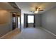 Upstairs bonus room with neutral carpet, ceiling fan and a window at 11416 Belmont Lake Dr # 102, Las Vegas, NV 89135