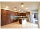 Inviting kitchen boasts granite countertops, stainless steel appliances, and ample wood cabinet space at 11416 Belmont Lake Dr # 102, Las Vegas, NV 89135