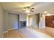Spacious living room with fireplace, staircase, and elegant flooring offers comfortable living at 11416 Belmont Lake Dr # 102, Las Vegas, NV 89135