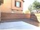 This backyard showcases a block wall and graveled landscaping for low maintenance at 1152 Paradise Desert Ave, Henderson, NV 89002