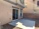 Sliding glass doors provide easy access to the concrete backyard patio for outdoor enjoyment at 1152 Paradise Desert Ave, Henderson, NV 89002