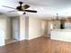 Inviting living room featuring sleek wood floors and bright, neutral wall colors at 1152 Paradise Desert Ave, Henderson, NV 89002