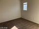 This bedroom offers a cozy carpet and bright natural light from the window at 11882 Snow Bank St, Las Vegas, NV 89183