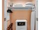Organized walk-in closet with built-in shelves, drawers, safe, and storage for clothes and accessories at 145 E Harmon Ave # 409, Las Vegas, NV 89109