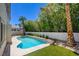Lush backyard featuring a pool and spa for serene outdoor relaxation at 153 Cascade Lake St, Las Vegas, NV 89148