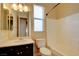 Bright bathroom featuring a vanity with a dark cabinet, with a shower and tub combo at 153 Cascade Lake St, Las Vegas, NV 89148