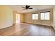 Spacious bedroom features wood floors, natural light, and a ceiling fan at 153 Cascade Lake St, Las Vegas, NV 89148
