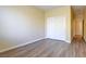 Bedroom featuring wood floors and a closet with doors at 153 Cascade Lake St, Las Vegas, NV 89148