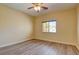 Bedroom features wood floors and a ceiling fan at 153 Cascade Lake St, Las Vegas, NV 89148