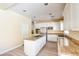 Well-lit kitchen features granite countertops, white cabinets, and stainless steel appliances at 153 Cascade Lake St, Las Vegas, NV 89148