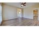 Living area upstairs features wood-look flooring and access to the hallway and other rooms at 153 Cascade Lake St, Las Vegas, NV 89148