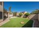 Spacious backyard with artificial turf and pool offers a great space for outdoor activities and relaxation at 2008 Spruce Brook Dr, Henderson, NV 89074