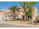 Charming two-story home with a well-manicured lawn and a three car garage at 2008 Spruce Brook Dr, Henderson, NV 89074
