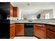 Kitchen with granite countertops, wood cabinets and stainless steel appliances at 2008 Spruce Brook Dr, Henderson, NV 89074