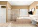 Bathroom with large tub, shower and vanity at 215 Great Gable Dr, Las Vegas, NV 89183