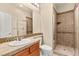 Tiled bathroom featuring a single sink vanity and walk-in shower at 215 Great Gable Dr, Las Vegas, NV 89183