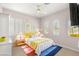 Bedroom with hardwood flooring, window shutters and wall art at 215 Great Gable Dr, Las Vegas, NV 89183