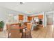 Eat-in kitchen features wooden cabinets, stainless steel appliances, and a breakfast nook at 215 Great Gable Dr, Las Vegas, NV 89183