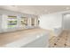 Bright and airy living room with large windows providing views of the pool area at 215 Great Gable Dr, Las Vegas, NV 89183