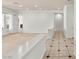 Spacious living area featuring neutral tones, tile flooring, and ample natural light at 215 Great Gable Dr, Las Vegas, NV 89183