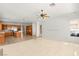 Open living space combines kitchen, living, and dining areas with abundant natural light at 215 Great Gable Dr, Las Vegas, NV 89183