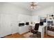 Home office featuring a white desk, dual monitors and lots of storage at 215 Great Gable Dr, Las Vegas, NV 89183