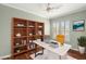 Bright home office with built-in shelving and modern desk at 215 Great Gable Dr, Las Vegas, NV 89183