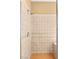 Close-up of shower with tiled walls and seating at 215 Great Gable Dr, Las Vegas, NV 89183