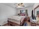 Bedroom with hardwood floors, natural light, and neutral paint at 2180 Polynesia Cir, Henderson, NV 89074