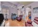 Open living room with vaulted ceilings, clerestory windows and hardwood floors at 2180 Polynesia Cir, Henderson, NV 89074