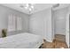 Bedroom showcasing wood flooring, a ceiling fan, and a closet at 2485 Jade Sky St, Henderson, NV 89044